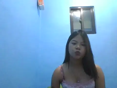 sweetcuteasian stripchat live cam model