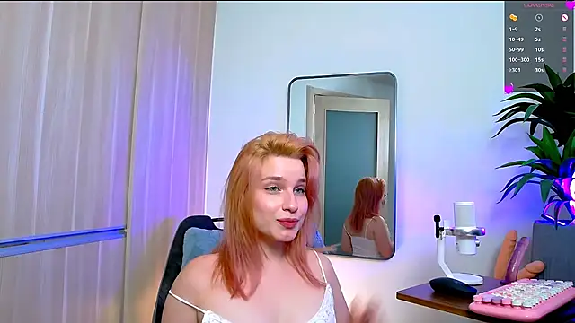 MinaGloww stripchat live cam model